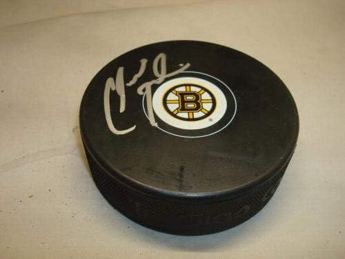 Клод Жулиен подписа хокей шайба Бостън Бруинс с автограф от 1B - за Миене на НХЛ с автограф